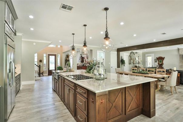 Dining room, Interior, Kitchen, Pendant Lights, Recessed Lighting, Stainless Steel Appliances, Wood Texture Flooring