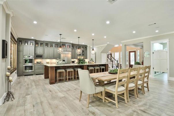 Dining room, Interior, Kitchen, Pendant Lights, Recessed Lighting, Stainless Steel Appliances, Wood Texture Flooring