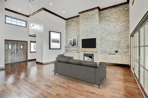 Fireplace, Interior, Living room, Pendant Lights, Recessed Lighting, Stone Walls, Wood Texture Flooring