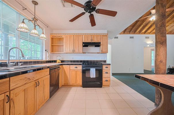 Interior, Kitchen, Pendant Lights, Tile Countertops, Wooden Ceilings