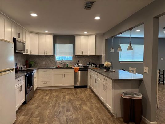 Interior, Kitchen, Pendant Lights, Recessed Lighting, Stainless Steel Appliances, Wood Texture Flooring