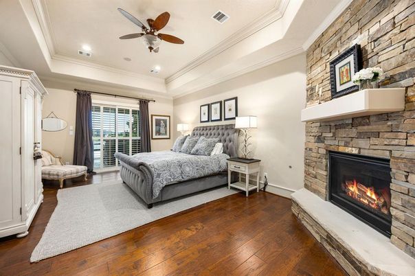 Bedroom, Fireplace, Interior, Recessed Lighting, Stone Walls, Wood Texture Flooring