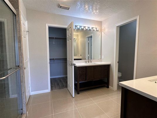 Bathroom, Dual Sink Vanities, Glass Shower, Interior, Wood Texture Flooring