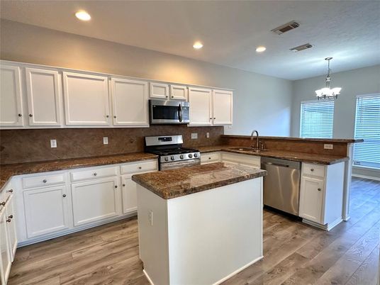 Chandelier, Interior, Kitchen, Recessed Lighting, Stainless Steel Appliances, Wood Texture Flooring
