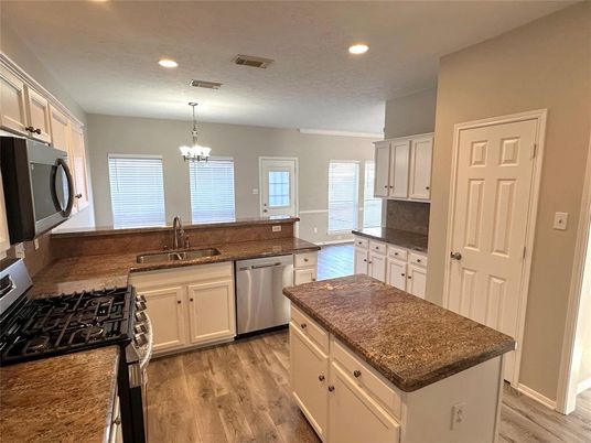 Chandelier, Interior, Kitchen, Recessed Lighting, Stainless Steel Appliances, Wood Texture Flooring