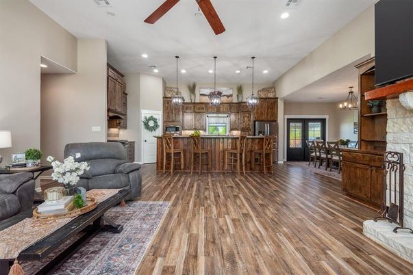 Dining room, Interior, Kitchen, Living room, Pendant Lights, Recessed Lighting, Stainless Steel Appliances, Wood Texture Flooring