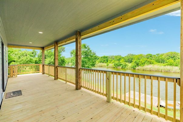 Exterior, Recessed Lighting, Water, Wood Texture Flooring