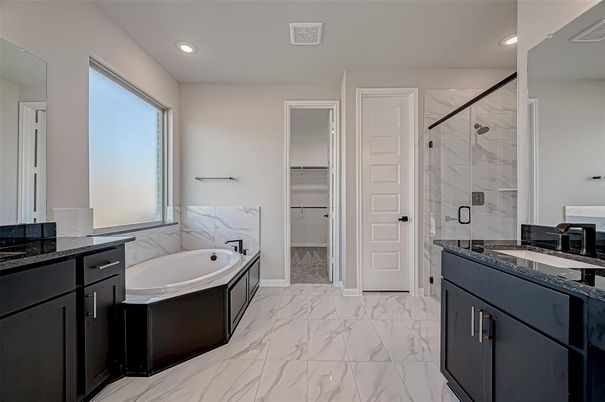 Bathroom, Dual Sink Vanities, Glass Shower, Interior, Marble, Marble Walls, Recessed Lighting
