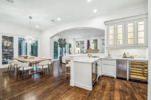 Dining room, Interior, Kitchen, Pendant Lights, Recessed Lighting, Stainless Steel Appliances, Wood Texture Flooring