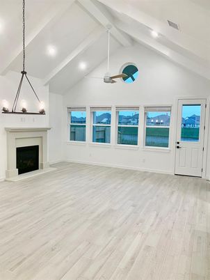 Empty room, Fireplace, Interior, Pendant Lights, Recessed Lighting, Wood Texture Flooring