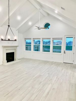 Empty room, Fireplace, Interior, Pendant Lights, Recessed Lighting, Wood Texture Flooring
