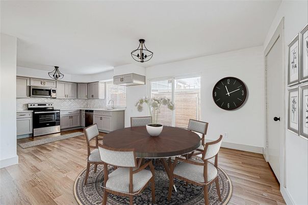 Dining room, Interior, Kitchen, Pendant Lights, Stainless Steel Appliances, Wood Texture Flooring
