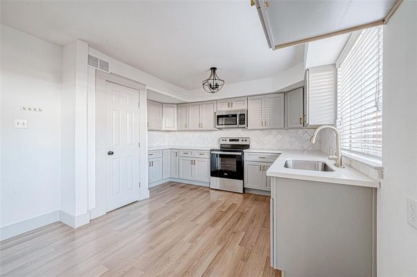 Interior, Kitchen, Pendant Lights, Stainless Steel Appliances, Wood Texture Flooring