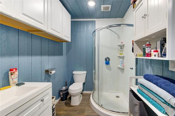 Bathroom, Glass Shower, Interior, Recessed Lighting, Wood Texture Flooring
