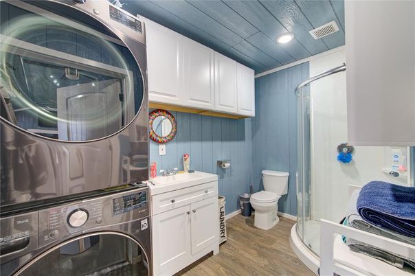 Bathroom, Interior, Recessed Lighting, Utility Closets, Washer, Wood Texture Flooring