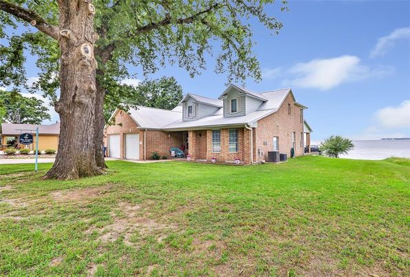 Attached, Backyard, Exterior, Facade, Brick Facade, Brick Traditional