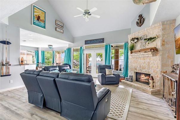 Fireplace, Interior, Living room, Recessed Lighting, Stone Walls, Wood Texture Flooring
