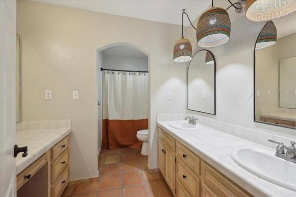 Bathroom, Dual Sink Vanities, Interior, Pendant Lights, Tile Countertops