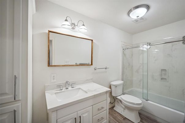 Bathroom, Glass Shower, Interior, Marble Walls, Wood Texture Flooring