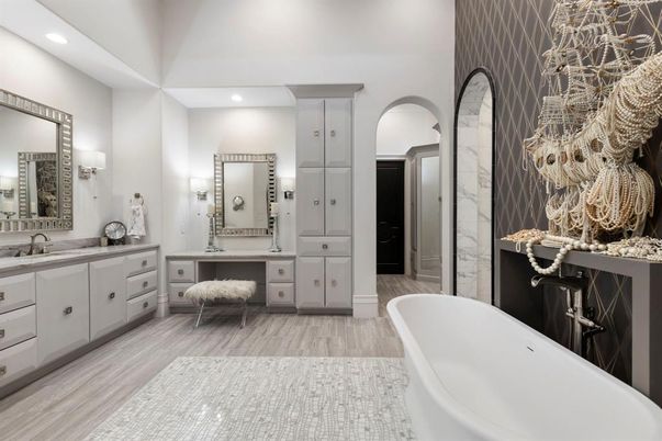 Bathroom, Dual Sink Vanities, Free Standing Baths, Interior, Marble Walls, Recessed Lighting, Wood Texture Flooring