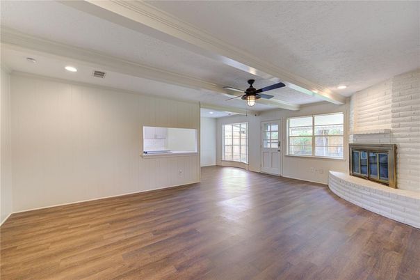 Empty room, Fireplace, Interior, Recessed Lighting, Stone Walls, Wood Texture Flooring
