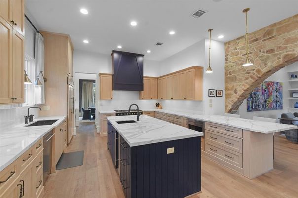 Interior, Kitchen, Pendant Lights, Recessed Lighting, Stainless Steel Appliances, Stone Walls, Wood Texture Flooring