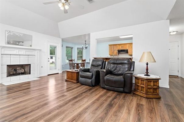 Chandelier, Dining room, Fireplace, Interior, Kitchen, Living room, Wood Texture Flooring