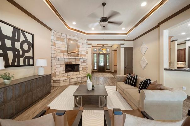 Fireplace, Interior, Living room, Recessed Lighting, Stone Walls, Wood Texture Flooring