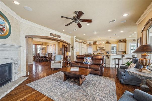 Chandelier, Dining room, Fireplace, Interior, Kitchen, Living room, Recessed Lighting, Wood Texture Flooring