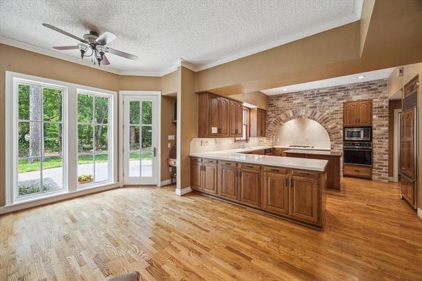 Interior, Kitchen, Recessed Lighting, Stone Walls, Wood Texture Flooring