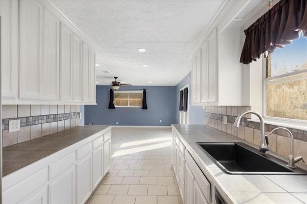 Interior, Kitchen, Recessed Lighting, Tile Countertops
