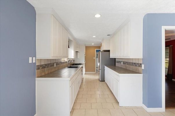 Interior, Kitchen, Recessed Lighting, Tile Countertops