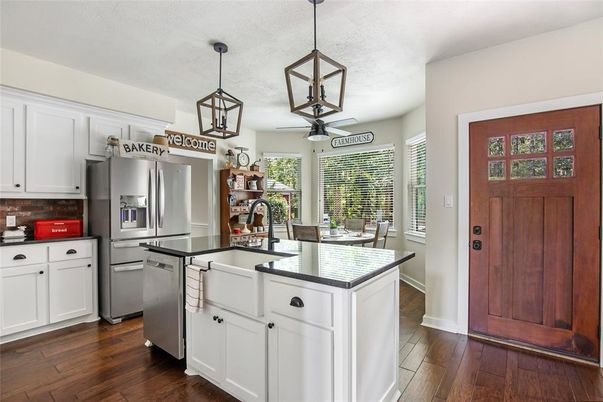 Dining room, Interior, Kitchen, Pendant Lights, Stainless Steel Appliances, Wood Texture Flooring