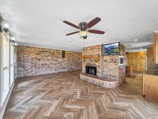 Fireplace, Interior, Recessed Lighting, Stone Walls, Wood Texture Flooring