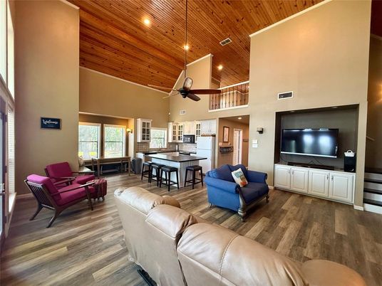 Dining room, Interior, Kitchen, Living room, Recessed Lighting, Stainless Steel Appliances, Wooden Ceilings, Wood Texture Flooring