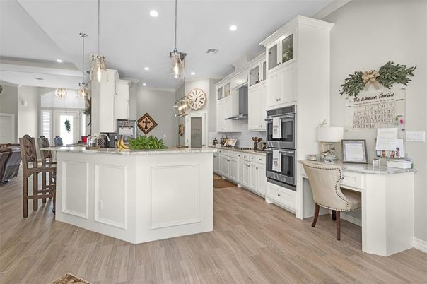 Dining room, Interior, Kitchen, Pendant Lights, Recessed Lighting, Stainless Steel Appliances, Wood Texture Flooring