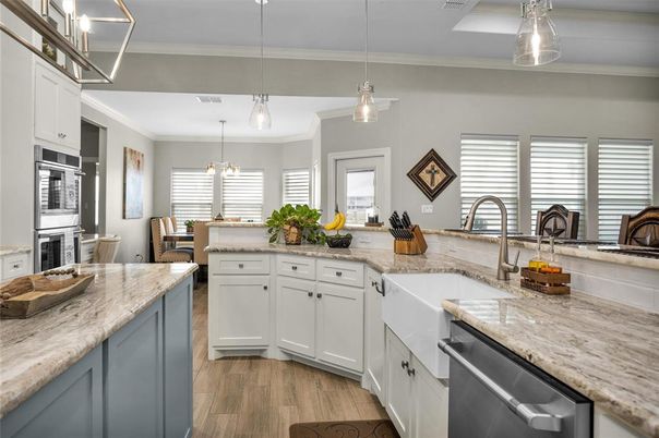 Dining room, Interior, Kitchen, Pendant Lights, Stainless Steel Appliances, Wood Texture Flooring