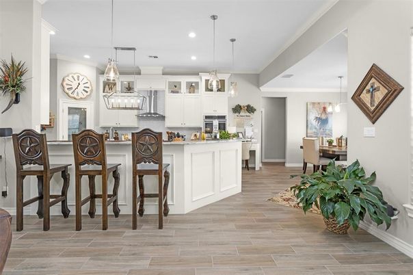 Dining room, Interior, Kitchen, Pendant Lights, Recessed Lighting, Stainless Steel Appliances, Wood Texture Flooring