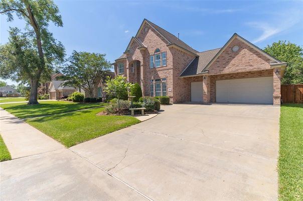 Attached, Backyard, Exterior, Facade, Brick Facade, Brick Traditional