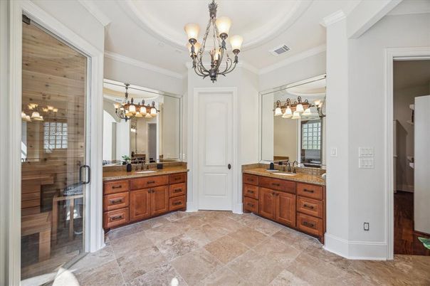 Bathroom, Chandelier, Dual Sink Vanities, Glass Shower, Interior, Wooden Walls