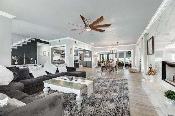 Chandelier, Dining room, Fireplace, Interior, Living room, Recessed Lighting, Wood Texture Flooring