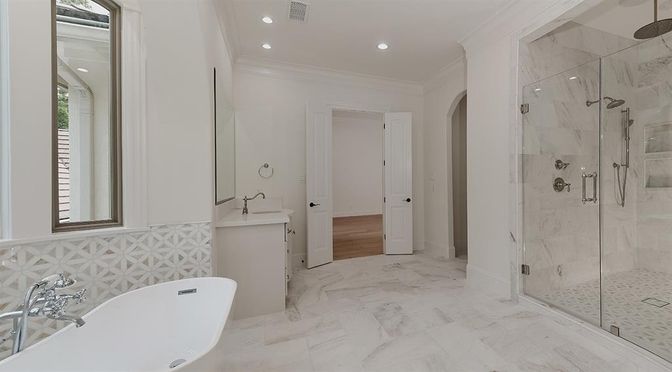 Bathroom, Free Standing Baths, Glass Shower, Interior, Marble, Marble Walls, Recessed Lighting, Wood Texture Flooring