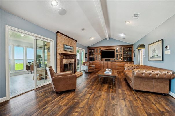 Fireplace, Interior, Living room, Recessed Lighting, Water, Wood Texture Flooring
