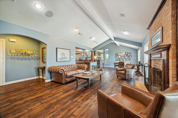 Dining room, Fireplace, Interior, Living room, Recessed Lighting, Wood Texture Flooring