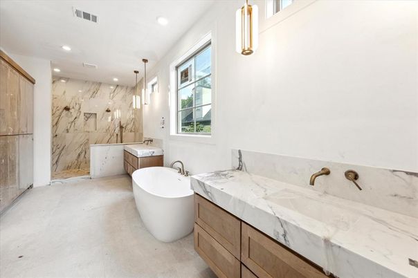Bathroom, Dual Sink Vanities, Free Standing Baths, Glass Shower, Interior, Marble Walls, Pendant Lights, Recessed Lighting