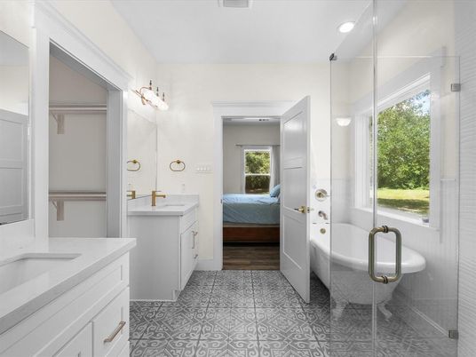 Bathroom, Dual Sink Vanities, Interior, Pendant Lights, Recessed Lighting, Wood Texture Flooring