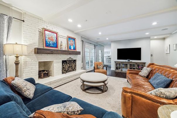 Fireplace, Interior, Living room, Recessed Lighting, Stone Walls, Wood Texture Flooring