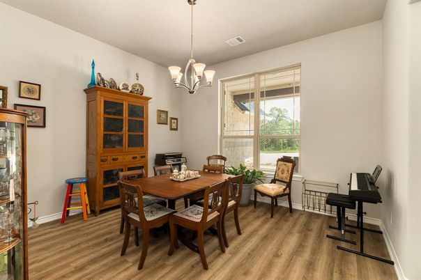 Chandelier, Dining room, Interior, Piano, Wood Texture Flooring