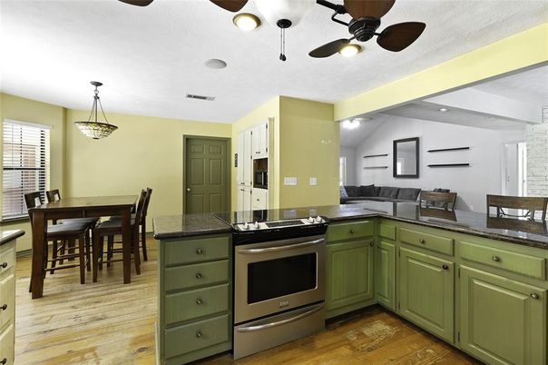 Dining room, Interior, Kitchen, Living room, Pendant Lights, Stainless Steel Appliances, Wood Texture Flooring