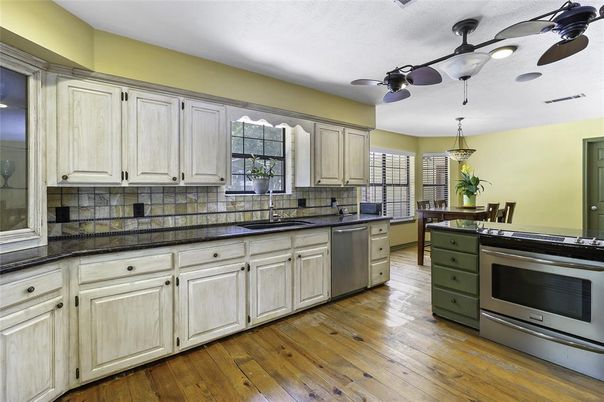 Dining room, Interior, Kitchen, Pendant Lights, Stainless Steel Appliances, Wood Texture Flooring